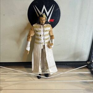 WWE Action Figure in White and Gold Attire